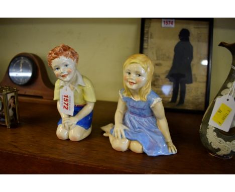 A rare pair of Royal Worcester figures of 'Punch &amp; Judy',&nbsp;Nos. 3488 and 3489 respectively, 15cm &amp; 14cm high. 