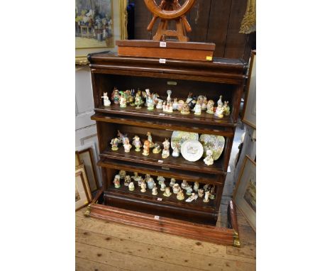 An early 20th century Globe Wernicke oak three tier sectional bookcase, labelled, 86cm wide.&nbsp; 