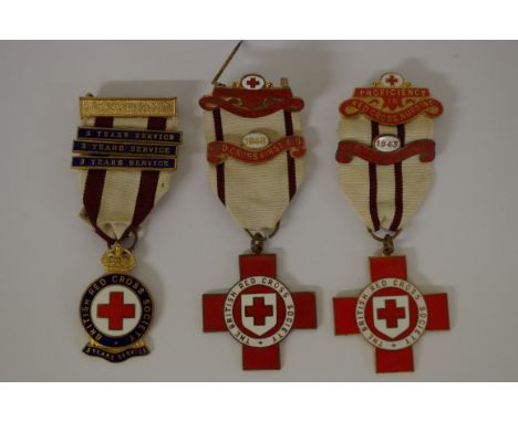 Three British Red Cross Society enamel medals.&nbsp; 
