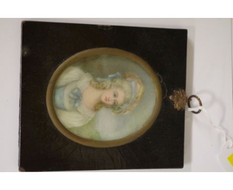 L.P.,&nbsp;bust length portrait miniature of a lady, initialled, watercolour, 8.9 x 7.2cm oval.&nbsp; 