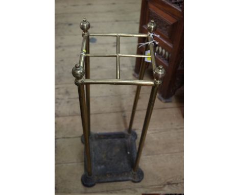 A Victorian brass four division stick stand. 