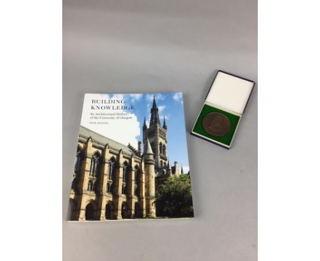 GLASGOW UNIVERSITY 500 YEAR ANNIVERSARY MEDAL, along with a book on the architectural history of Glasgow University, and a si