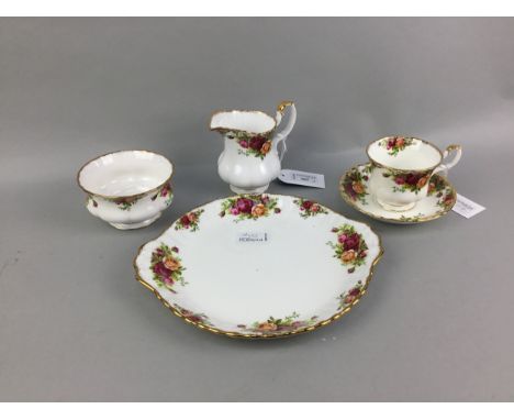 ROYAL ALBERT 'OLD COUNTRY ROSES' PART TEA SERVICE, comprising 8 cups, 8 saucers, sugar, milk and cake plate