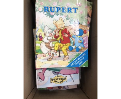 LOT OF RUPERT THE BEAR ANNUALS, along with a poster and a plate