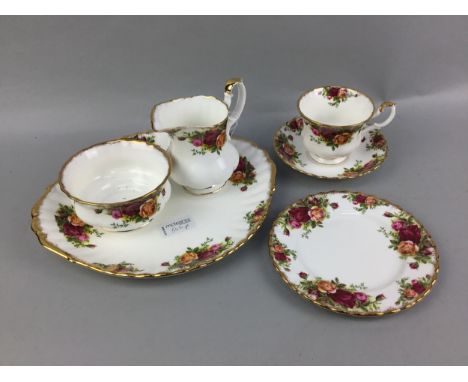 ROYAL ALBERT 'OLD COUNTRY ROSES' PATTERN TEA SERVICE, comprising 12 cups, 12 saucers, 12 side plaes, sugar, milk and a cake p
