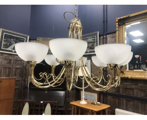 MODERN BRASS CEILING LIGHT, with eight branches and frosted glass shades