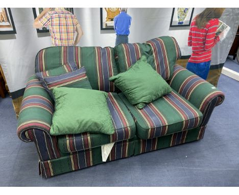 MODERN SOFA BED, upholstered in blue, red and yellow on a green ground, 180cm wide