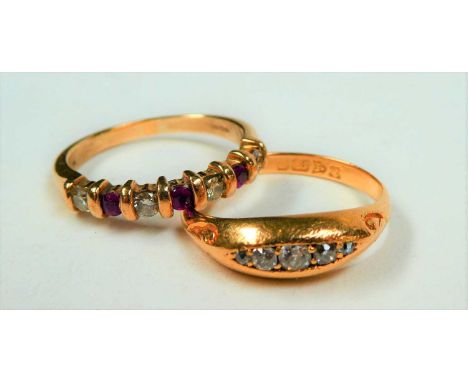 An 18 carat gold diamond five stone ring, finger size P; and a 9 carat gold ruby and diamond seven stone ring, finger size O1