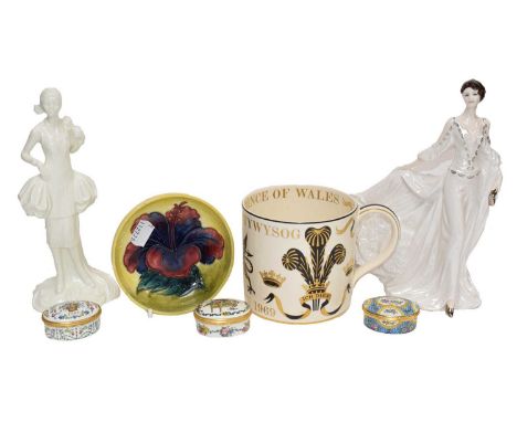 A Moorcroft hibiscus pattern dish, two Royal Worcester figures, a Wedgwood mug by Richard Guyatt and three Halcyon days ename