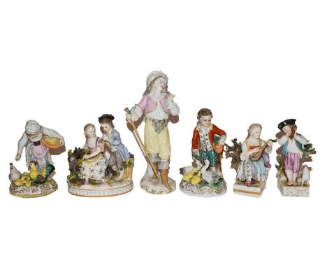 A collection of early 20th century German porcelain figures including a Meissen style figure of a Dandy, pair of Dresden figu