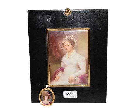 A Portrait miniature on porcelain, signed Leslie Johnson; together with a porcelain brooch by the same hand