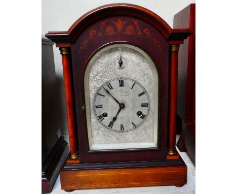A mahogany inlaid chiming mantel clock, circa 1900, movement chiming on gong rods, 36cm