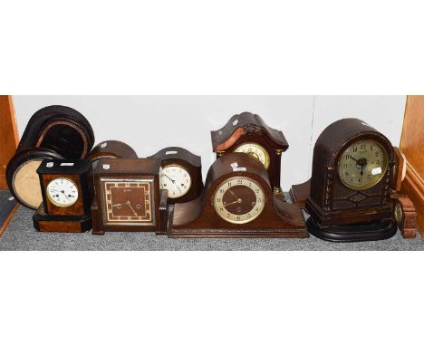 A quantity of mainly 1940s mantel clocks including Bulle, Bakelite, Bentima and Smiths examples; together with five clock pli