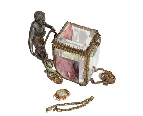 A Cold Painted and Gilt-Metal Watch Case in the form of a sedan chair with glazed sides and cover, being pushed by a figure; 