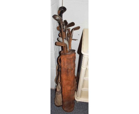 Three vintage golf bags containing an assortment of Hickory golf clubsCondition report: There are 20 hickory shafted golf clu