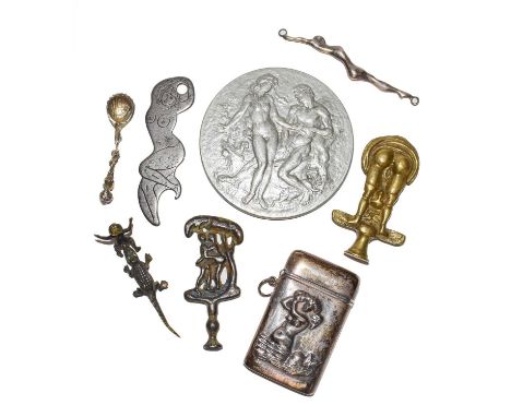 Small group of erotica and other items, comprising a 925 vesta case, silver spoon and figure; brass pipe tamper and another, 