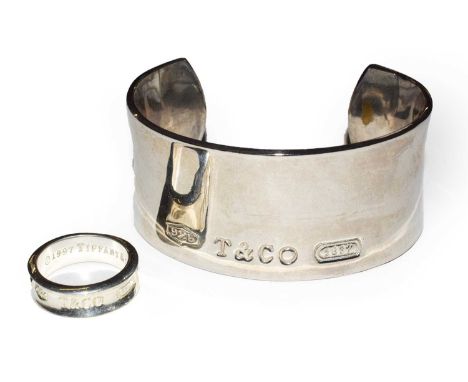 A Tiffany &amp; Co. bangle; together with a Tiffany &amp; Co., finger size PCondition report: Both stamped '925'. Gross weigh