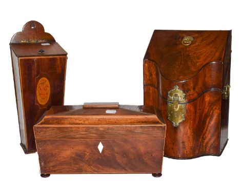 A George III mahogany serpentine knife box, a similar inlaid candle box and a Regency fitted mahogany tea caddyCondition repo