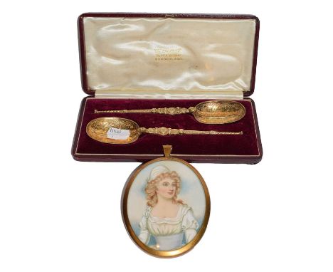 A cased pair of George V silver gilt spoons, London, 1930, Cornelius Desormeaux Saunders &amp; James Francis Hollings Shepher