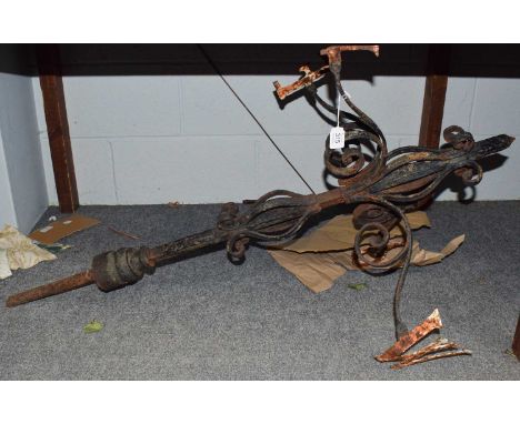 A cast metal weather vane, in need of repair