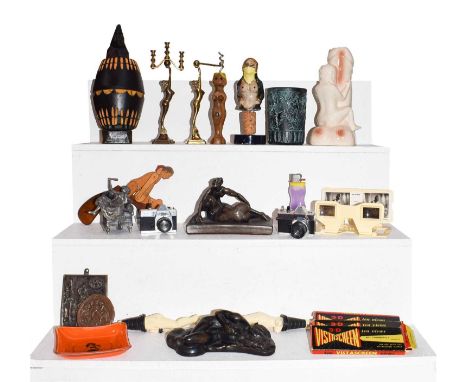 Assorted 20th century 'erotica' items, comprisng composite figure groups, two miniature stanhope type cameras, two glass pape