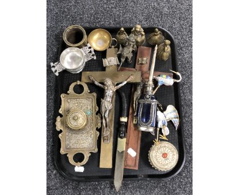 A tray of crucifixes, brass bells, desk stand, enamel bird ornaments etc