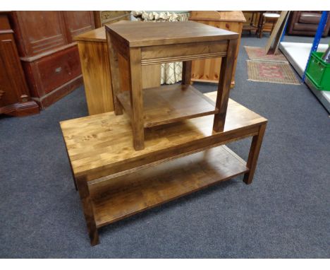 A contemporary coffee table with matching lamp table  