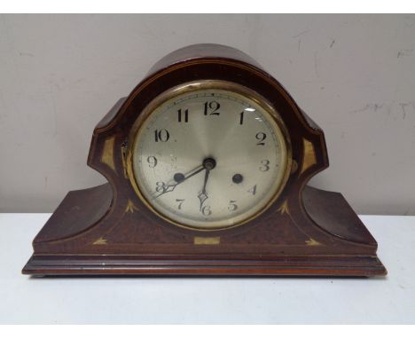 An Edwardian inlaid mahogany mantel clock with silvered dial 