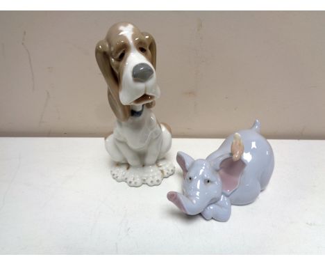 Two Nao figures of a hound and an elephant. (2)