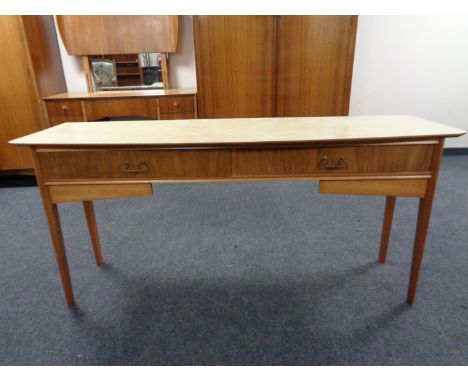 A mid 20th century two drawer flap sided console table with melamine top 