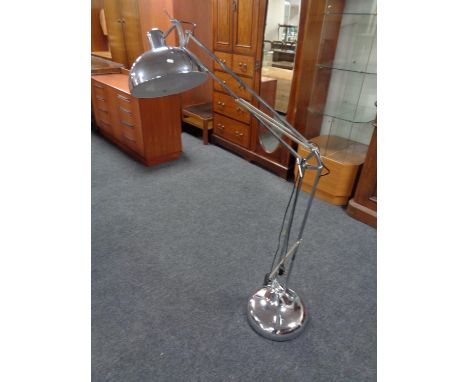 A contemporary floor standing angle poise lamp 