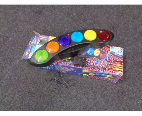 A boxed Steepletone disco light 