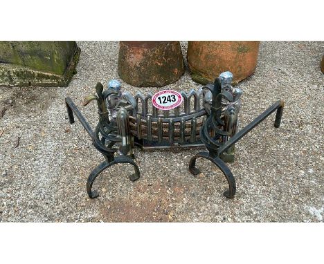 A PAIR OF WROUGHT IRON FIRE DOGS AND TWO CAST IRON FIREPLACE PARTS / ALL LOTS ARE LOCATED IN SL0 9LG, REGRETFULLY WE DO NOT O