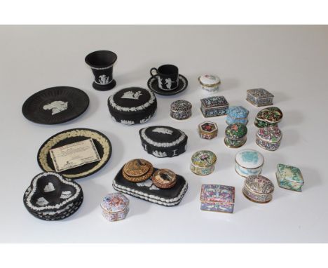 A collection of black and white Wedgwood and a number of ceramic pill boxes