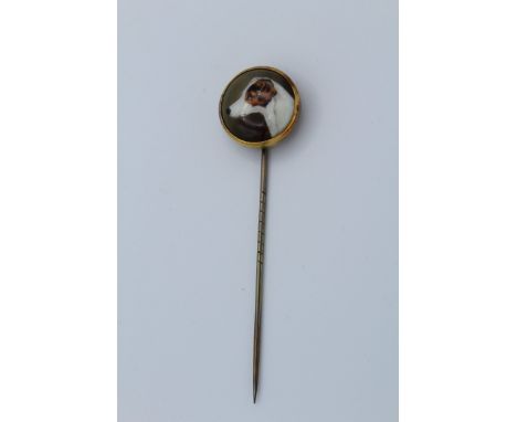 A Victorian stick pin with enamel finial of terriers portrait ' Bitters' , signed verso W B Ford and dated 1876 in yellow met
