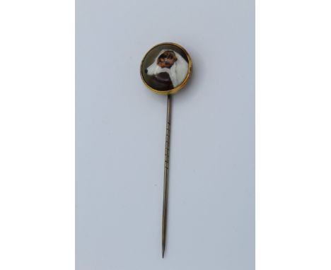 A Victorian stick pin with enamel finial of terriers portrait ' Bitters' , signed verso W B Ford and dated 1876 in yellow met