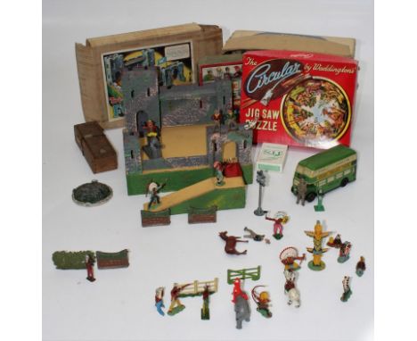 A selection of mainly post war toys, including jigsaws, solitaire, table games, dominoes, Chad Valley etc. Included is a self