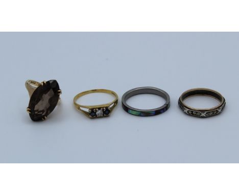 A collection of dress rings featuring an 18ct gold diamond and sapphire modernist ring, size U 1/2, approximate gross weight 