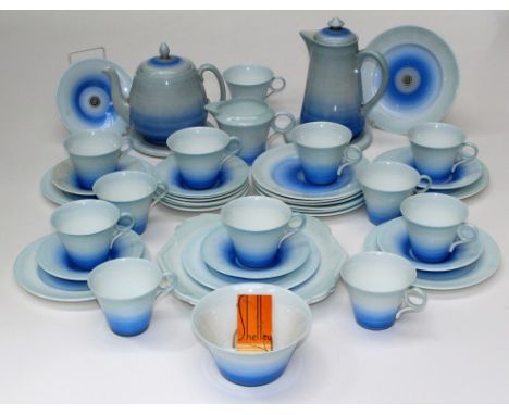 A 1930's Shelley Art Deco tea service, numbered W 12170, comprising tea and hot water pots and stands, milk jug, sugar, two c