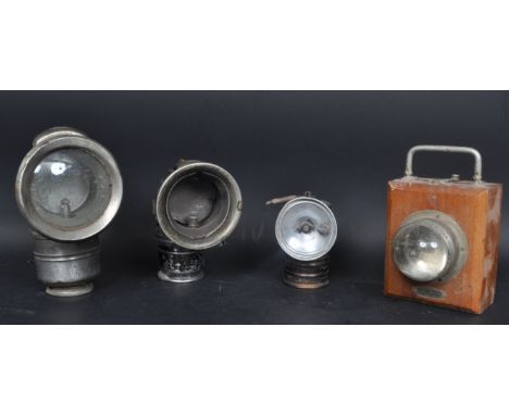 A collection of early 20th century bicycle lamps comprising of a The Revenge - Birmingham lamp, a Lucas Calcia Cadet lamp, Pr