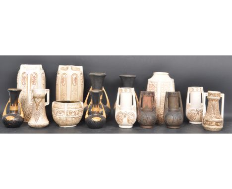 A large collection of Edwardian era early 20th century Bretby 'Clanta' art pottery to include a quantity of Art Nouveau inspi