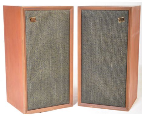 A pair of retro vintage mid 20th century Wharfdale Linton teak cased speakers of cuboid form having a black grill mesh to the
