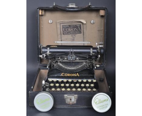 An early 20th century circa 1930s Corona portable typewriter. The typewriter having a folding mechanism with gold detailing. 