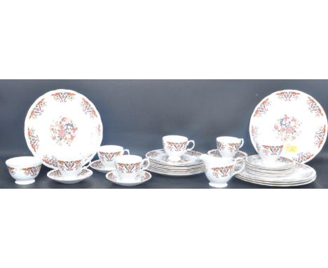 A vintage 20th century Colclough tea service in the 'Royal' pattern, each piece being painted in the Imari style.The service 