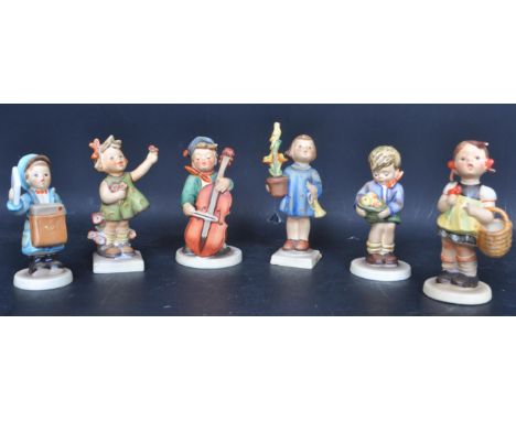 A collection of vintage 20th century Goebel Hummel West German Exclusive Edition 1991/92 china figurines in the form of child