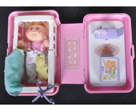 Cabbage Patch Dolls boxed toy set in pink travel case. Complete with the label for Candace Vanna - Birthday October 15