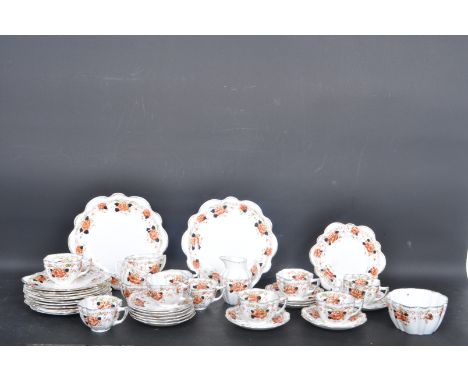 A large Victorian 19th century Melba bone china tea service comprising of teacups, saucers, sugar bowl, each piece having flo