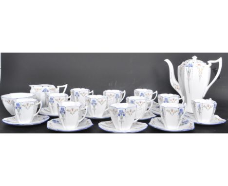 An early 20th century Shelley Fine China Art Deco period circa 1930s Queen Anne shape Blue Iris pattern coffee / tea set comp