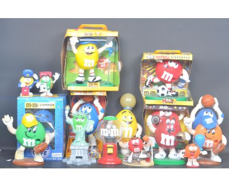 A large collection of 20th century plastic M&amp;M chocolate collectable figurines. To include boxed and unboxed example such