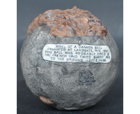 An early 20th century Rye Gosse ware / crested ware model of a cannon ball excavated at Landgate, Rye 1907. With Cique Port o